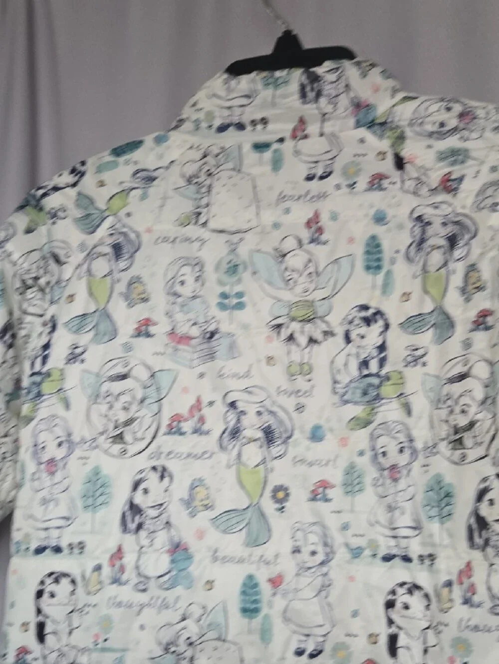 Disney Quilted Puffer Jacket with Cream Background and Pastel Accents